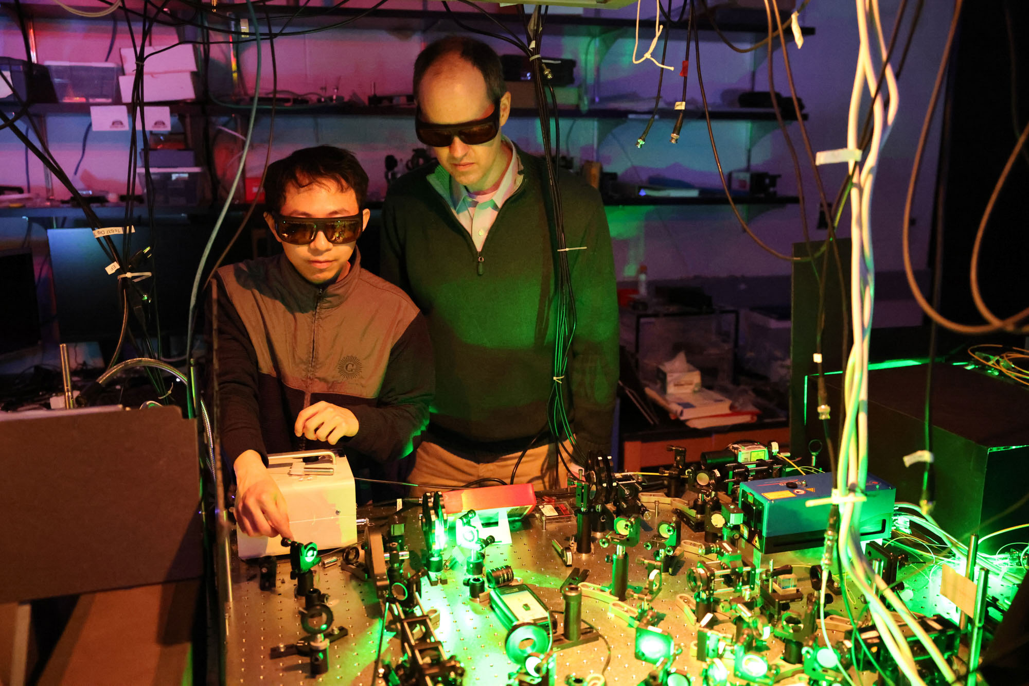 PhD Jialun Luo and professor Greg Fuchs work in the Fuchs lab