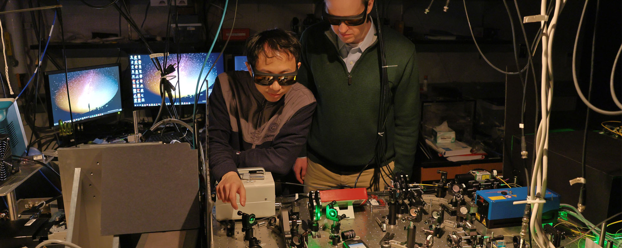 PhD Jialun Luo and professor Greg Fuchs work in the Fuchs lab