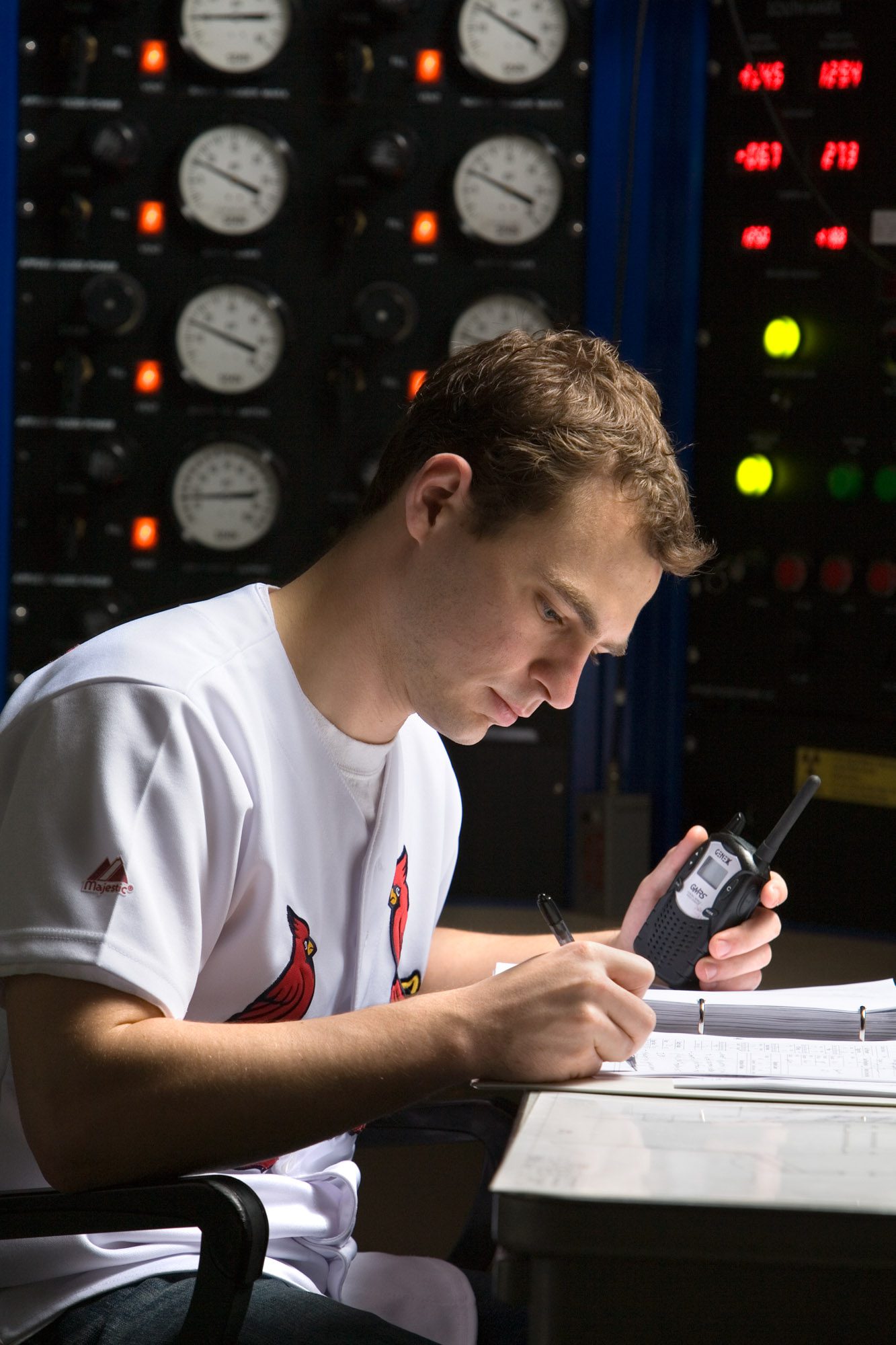 A student takes notes in the lab