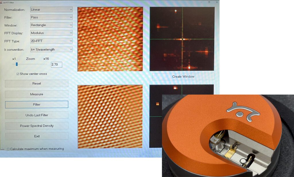 On the left a computer screen shows output from a scanning tunneling microscope. A close-up of the (an orange disk) is on the right.