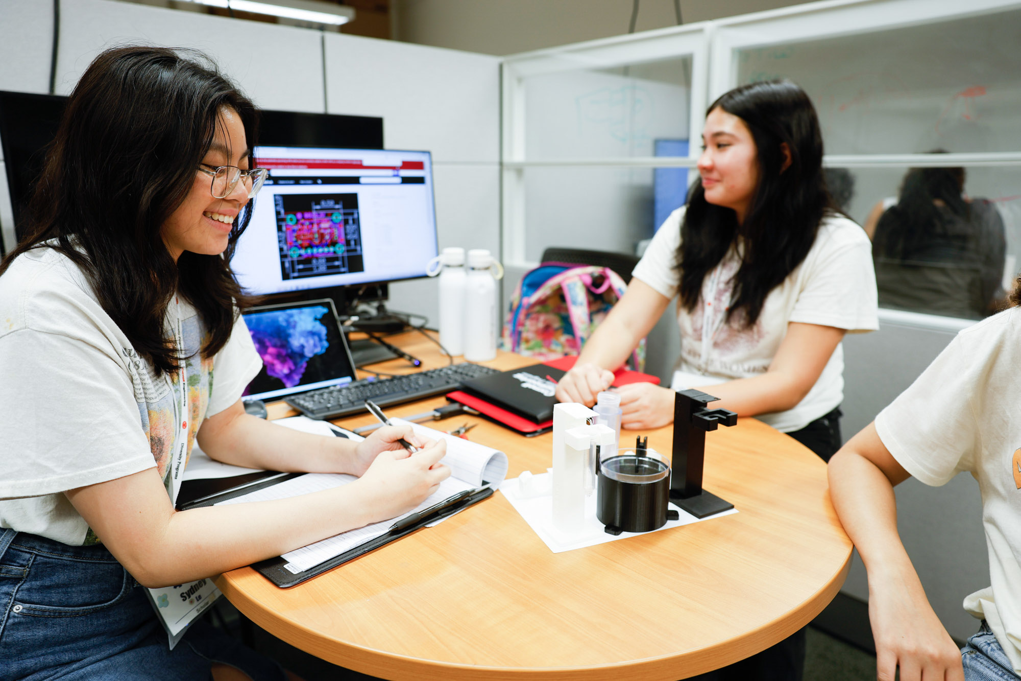 High school students work together on a biomedical engineering project in Weill Hall ideation lab.