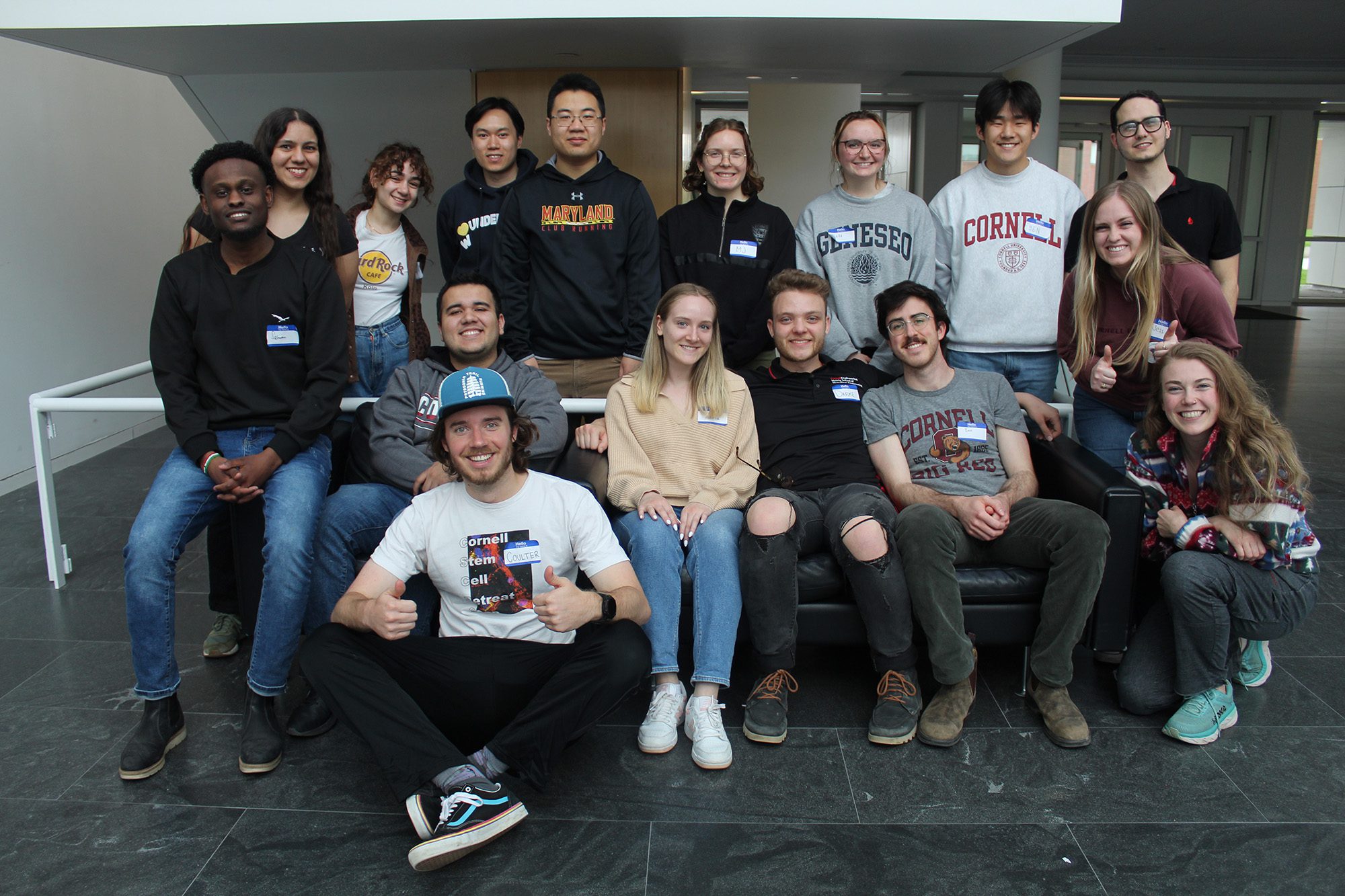 Graduate student group sitting together in Weill Hall atrium