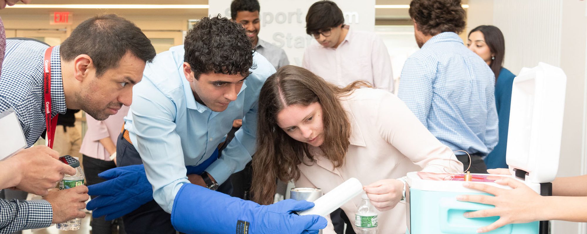 Students working with equipment during a Cornell Engineering Industry showcase day