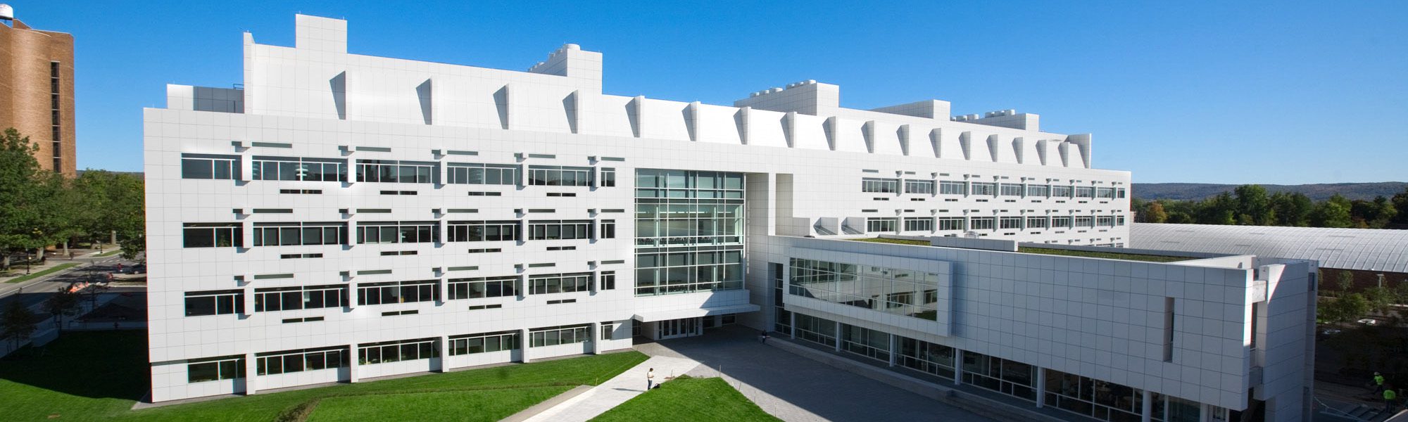 An outdoor aerial shot of Weill Hall - home of the Meinig School of Biomedical Engineering - on a sunny day
