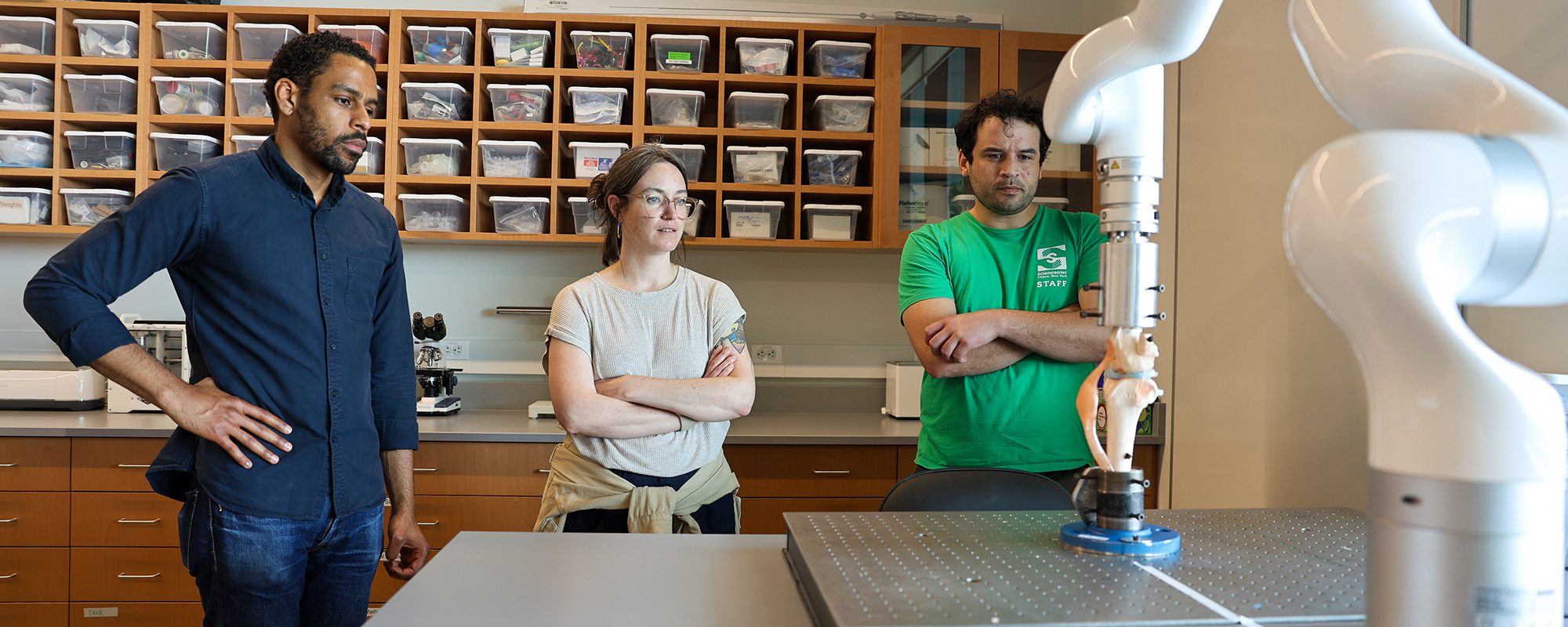 Karl Lewis working with members of the Ithaca Sciencenter to design a biomedical engineering exhibit for children.