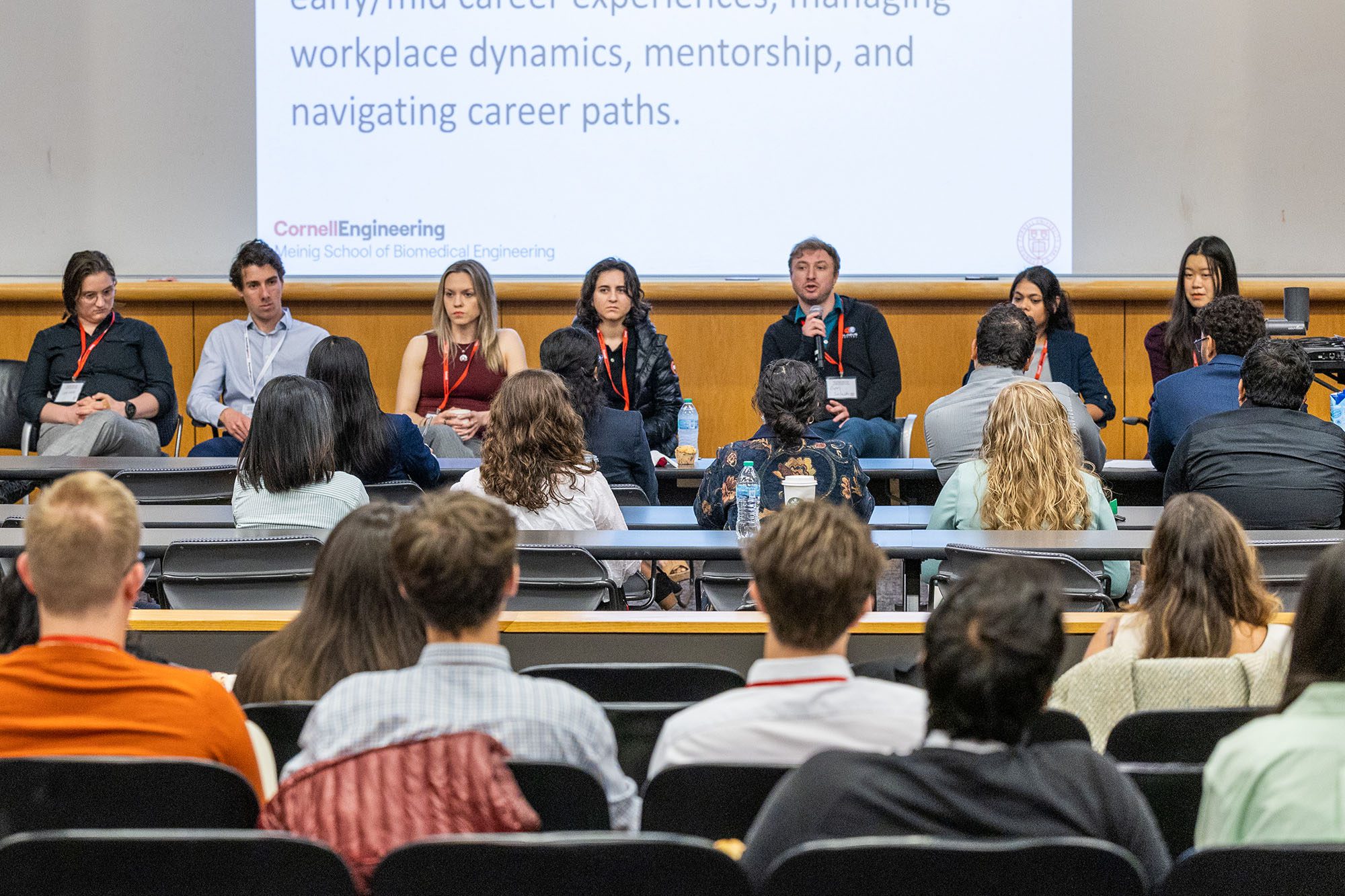 Alumni panels sit at front of Duffield Hall auditorium taking questions from a room full of MEng students at Industry Day 2025