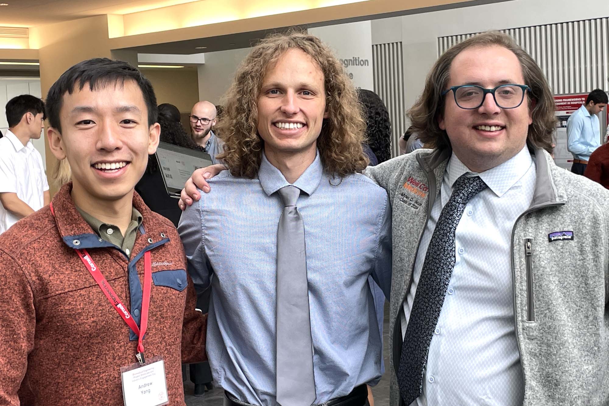 Three M.D.-M.Eng. students stand together in Weill Hall.
