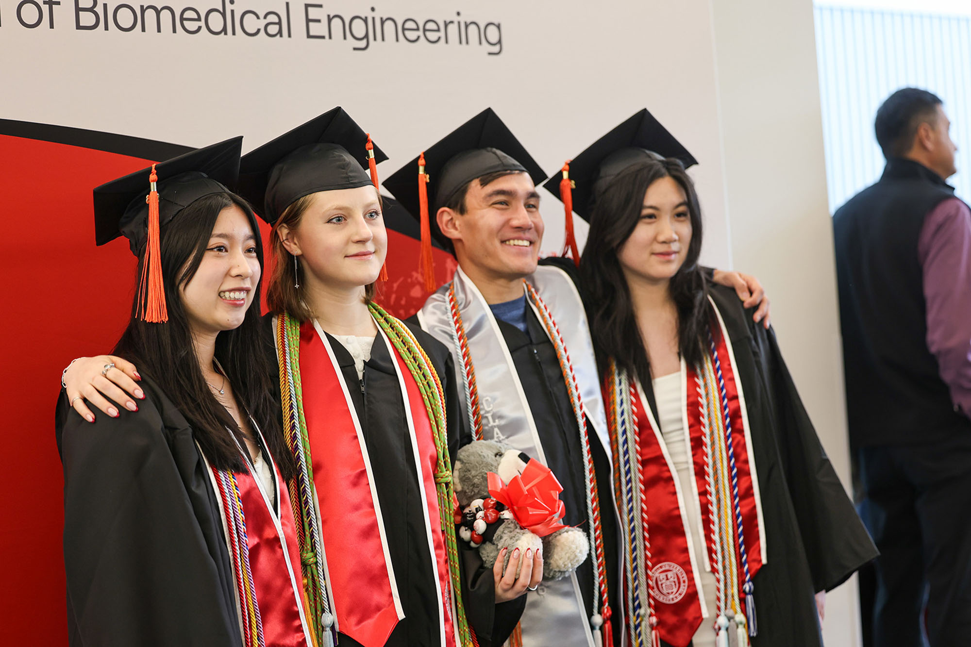 BME undergraduates stand in regalia in the Weill Hall Atrium during commencement May 2026.