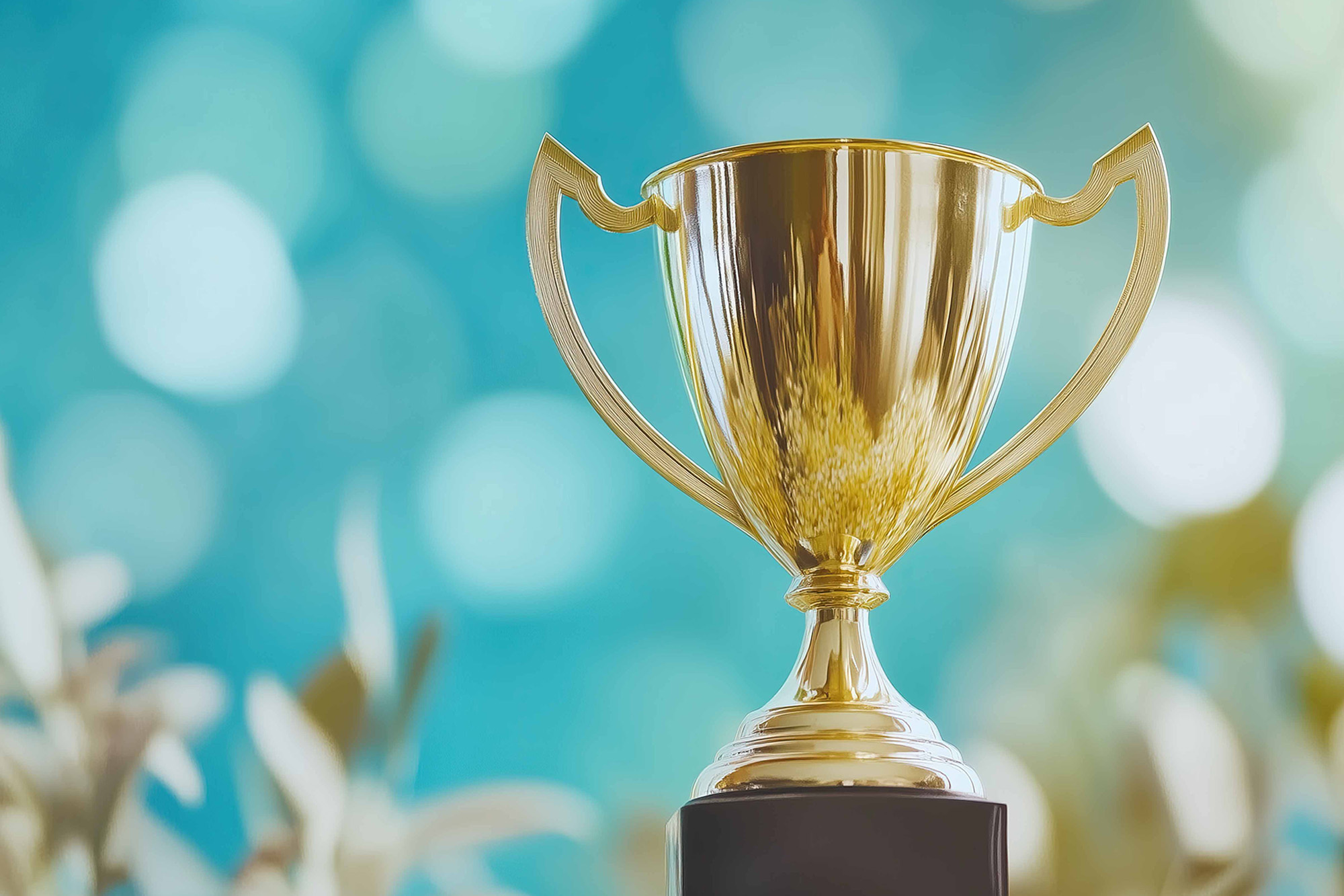 Gold trophy on a blue background.