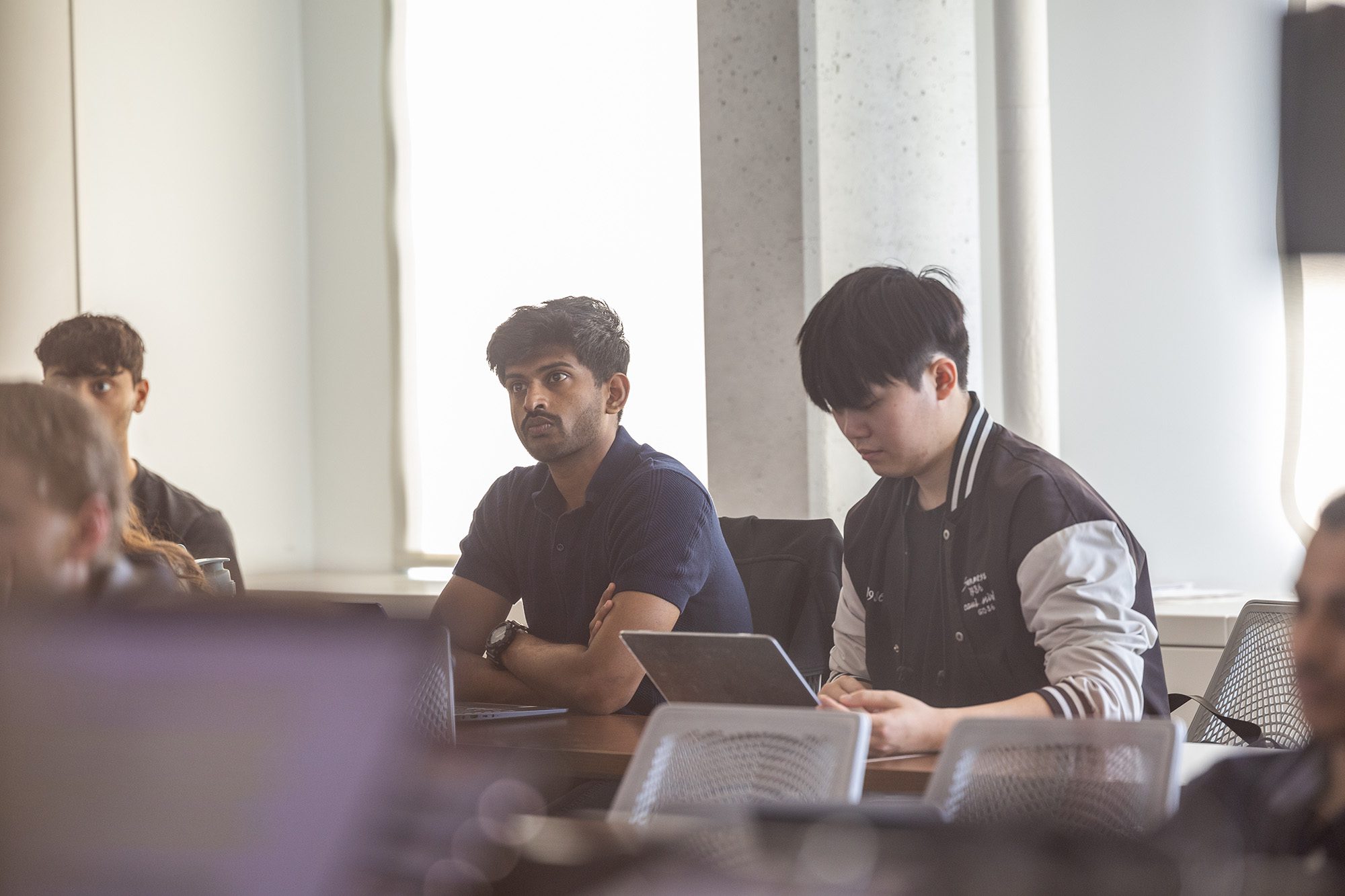 MEng Students sit at desks Upson Hall design class with Jeff Varner.