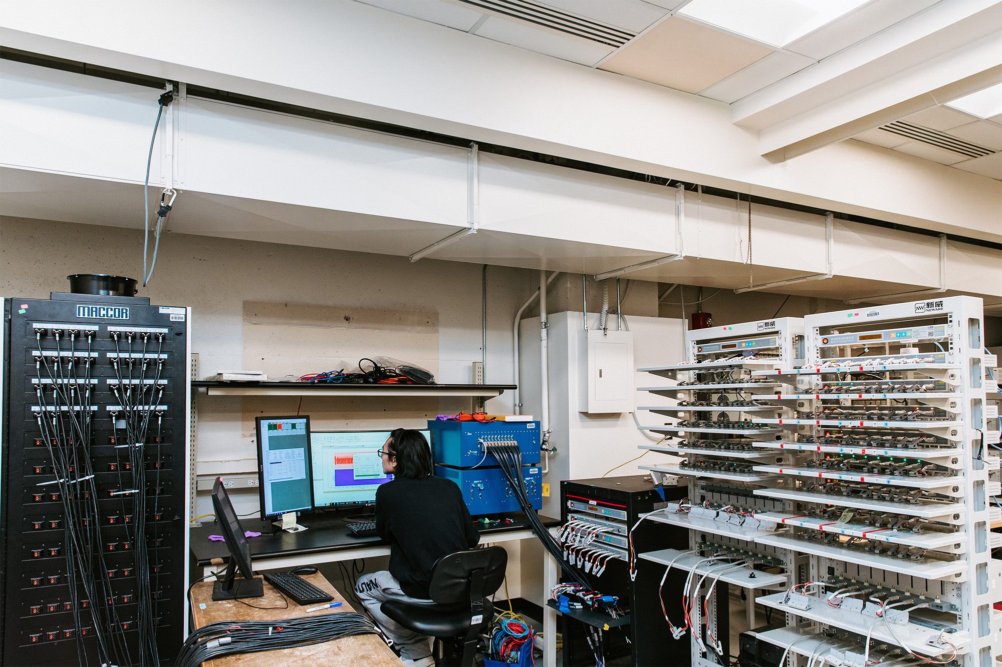 Student at a computer screen in the Kalra lab in Olin Hall.