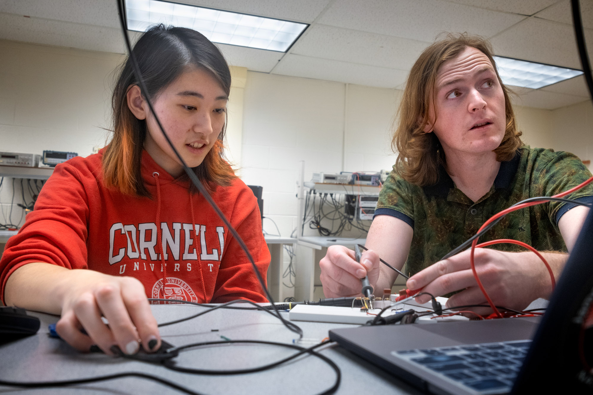 Two students work in an electronics lab in Phillips Hall
