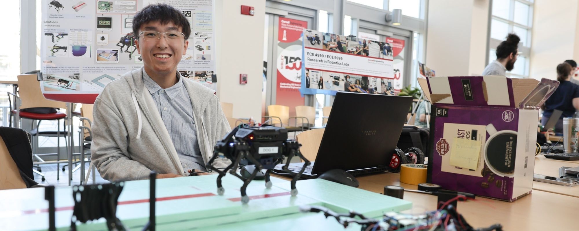 Student showcasing their robot during the annual Electrical and Computer Engineering Robotics Showcase event