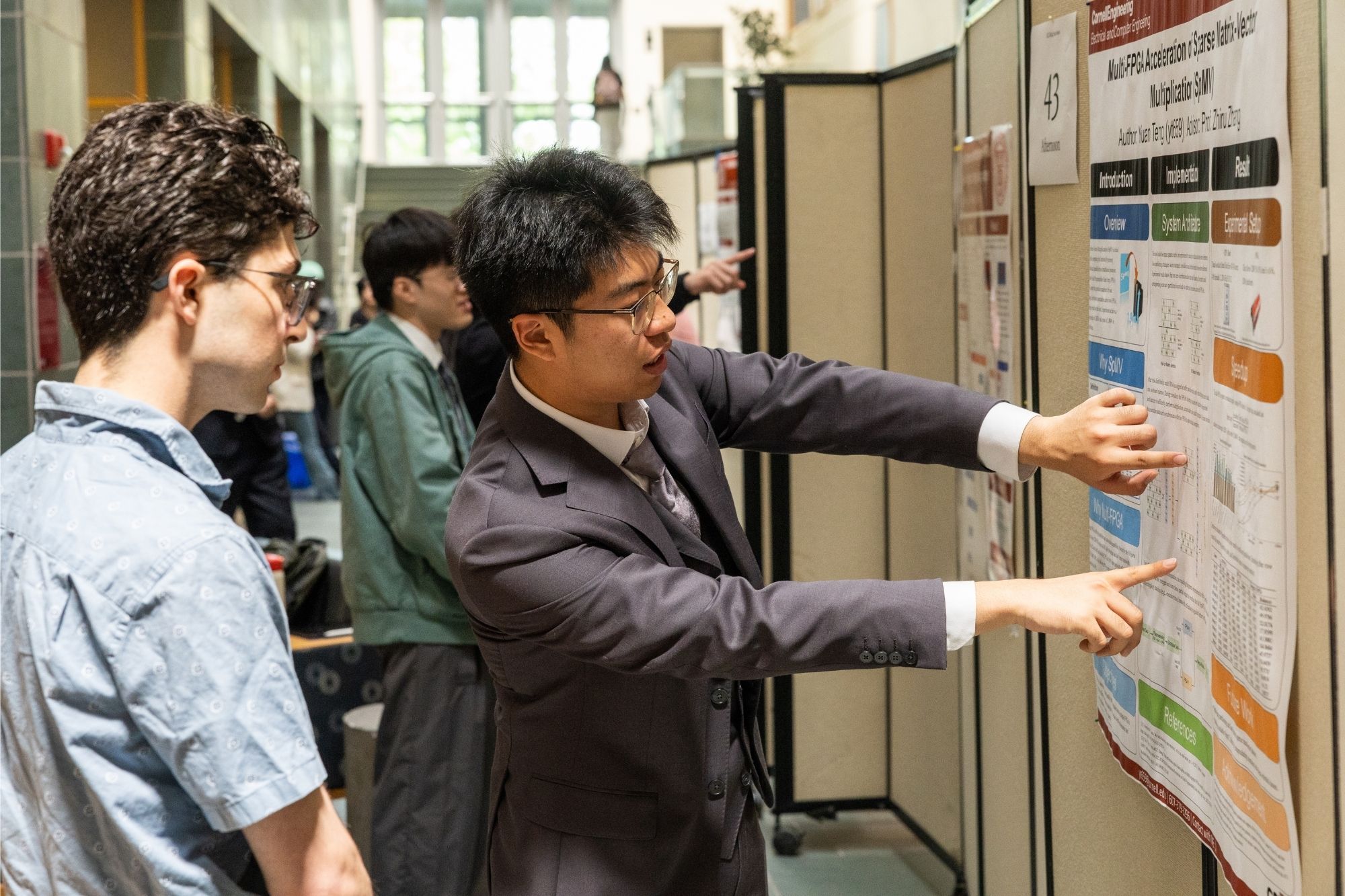 ECE students during an M.Eng. poster session