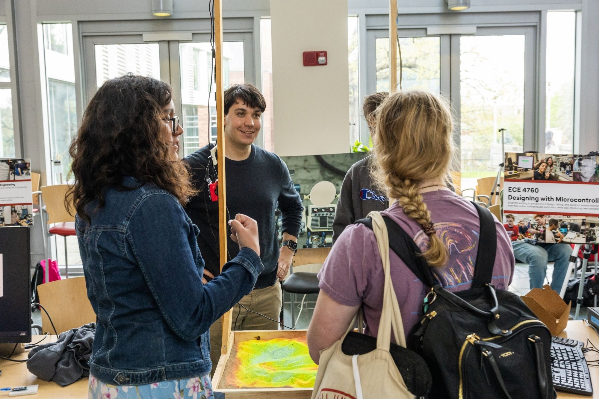 Students at the ECE M.Eng. Poster Session and Robotics Showcase