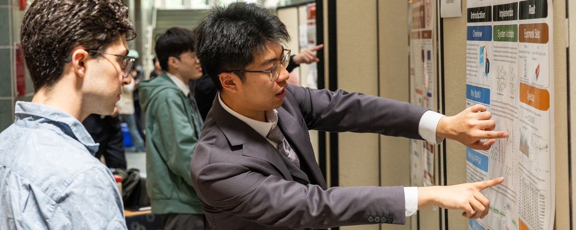 ECE students during an M.Eng. poster session