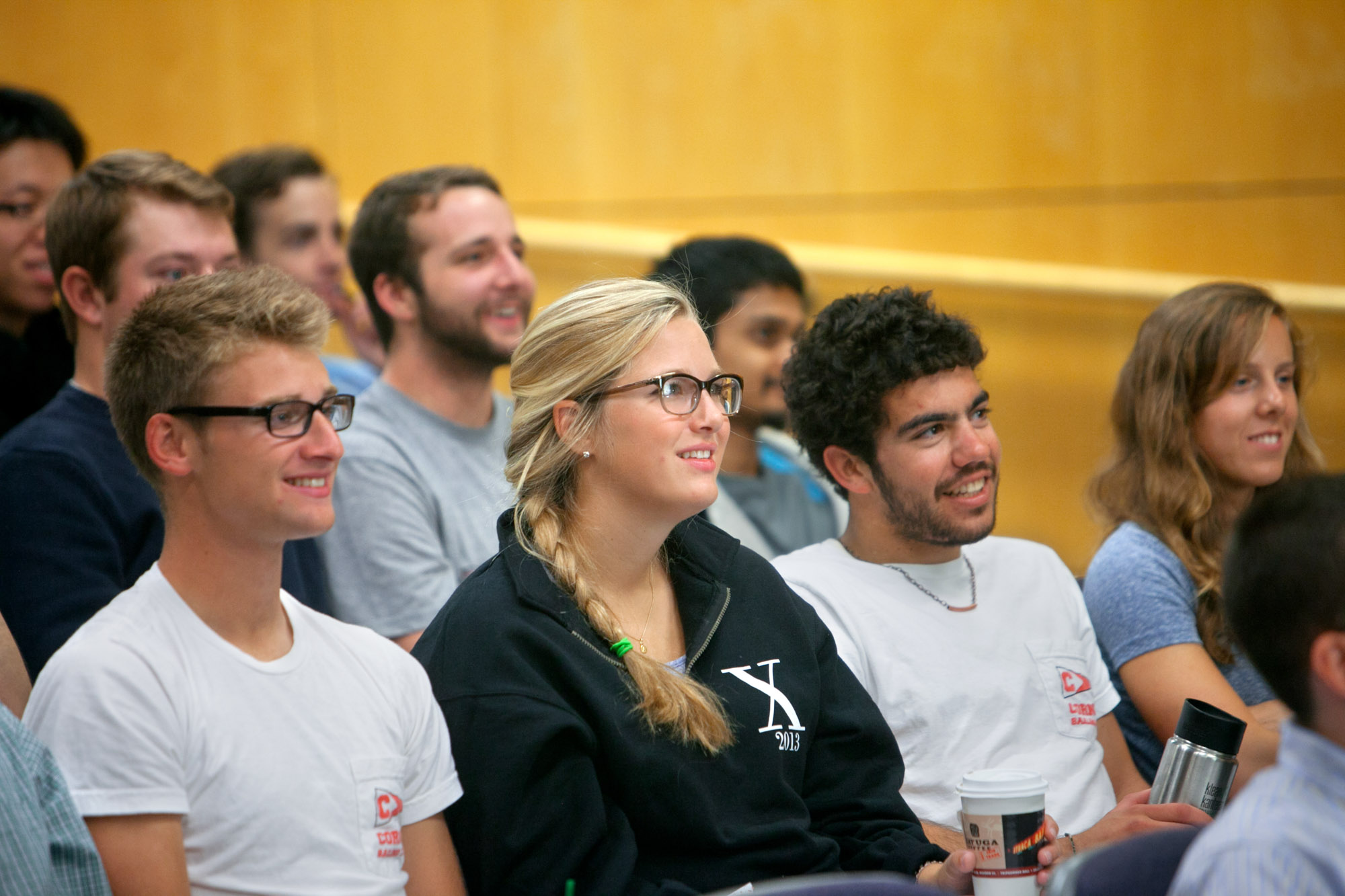 Students lin a lecture hall listen to Bill Nye '77, 
