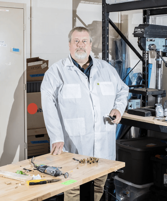 Mason Peck in his workshop at Cornell.