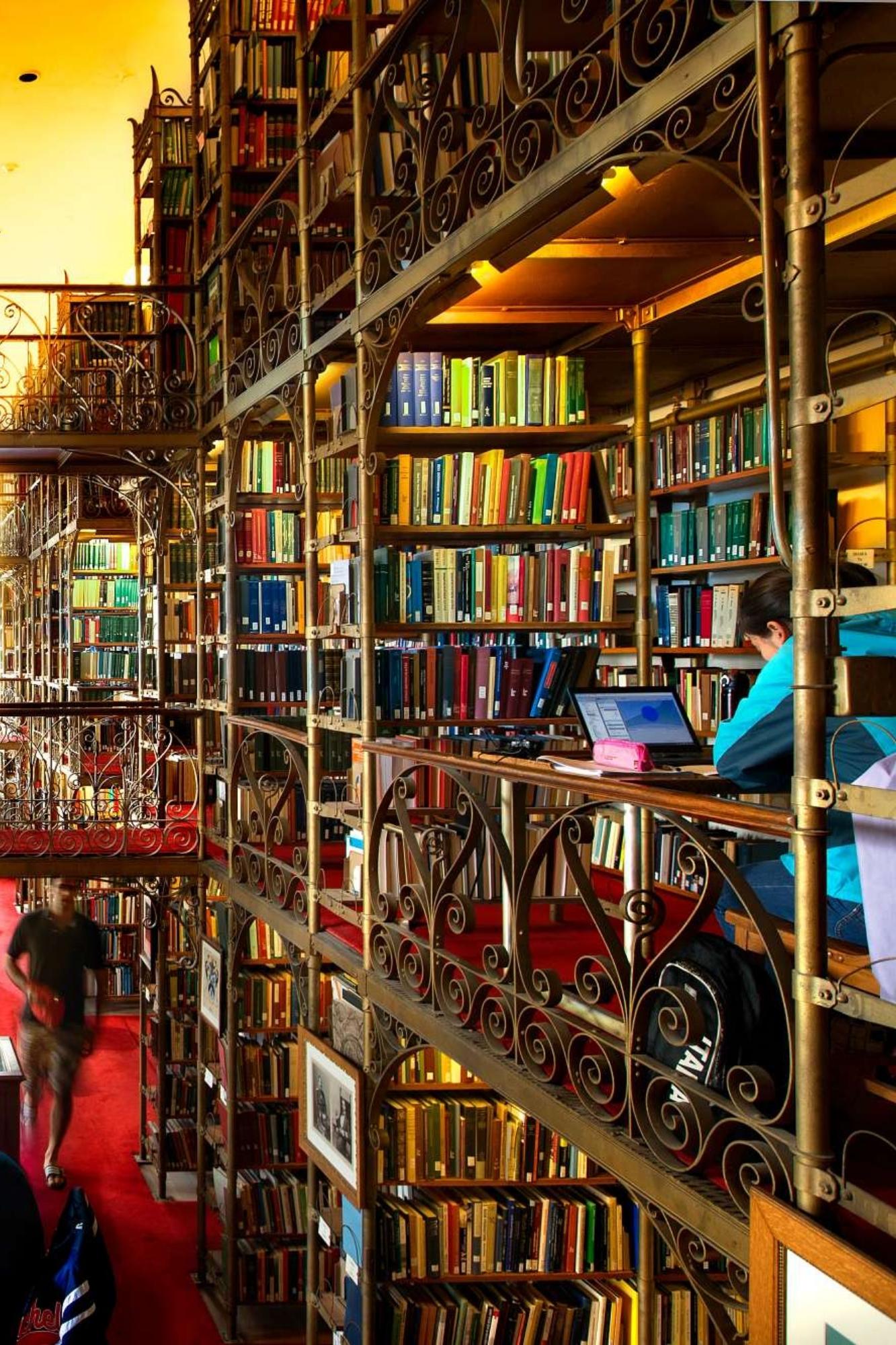 Multistory library with students working