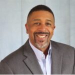 headshot of Kintu Early aspect ratio 1-1