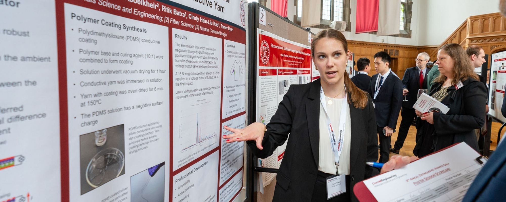 MSE student discussing their research poster during the distinguished awards gala