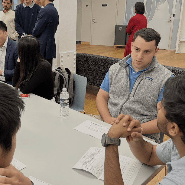 CFEM alumni talks with students.