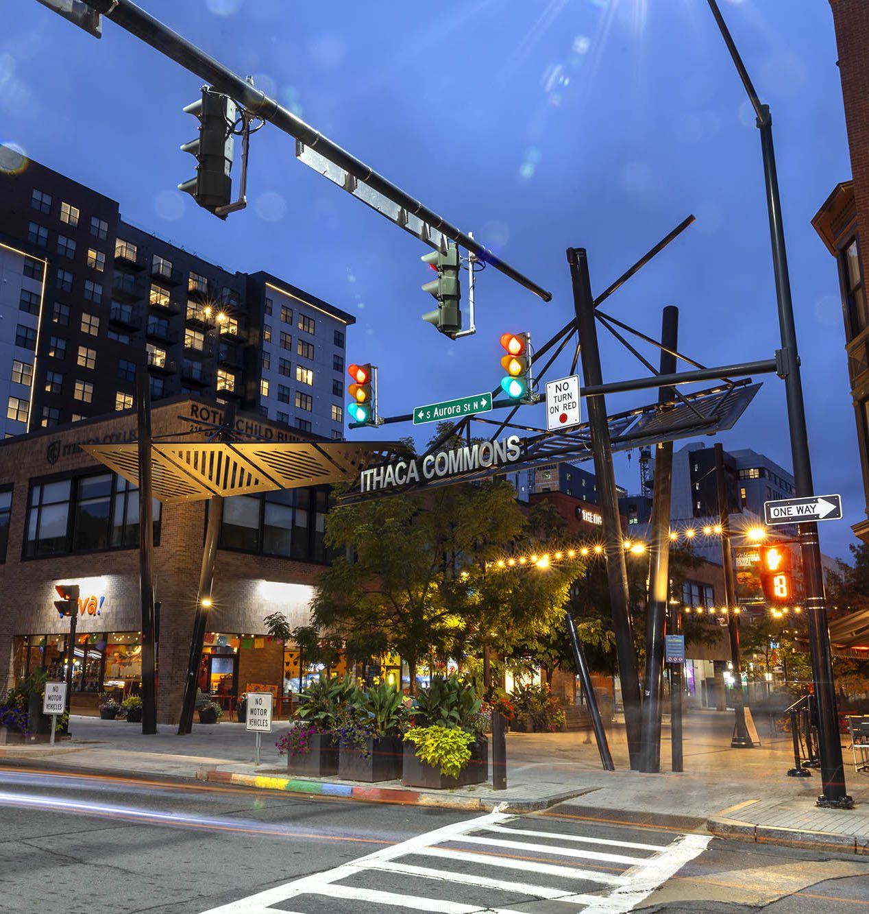 Nighttime view of entrance to Ithaca Commons