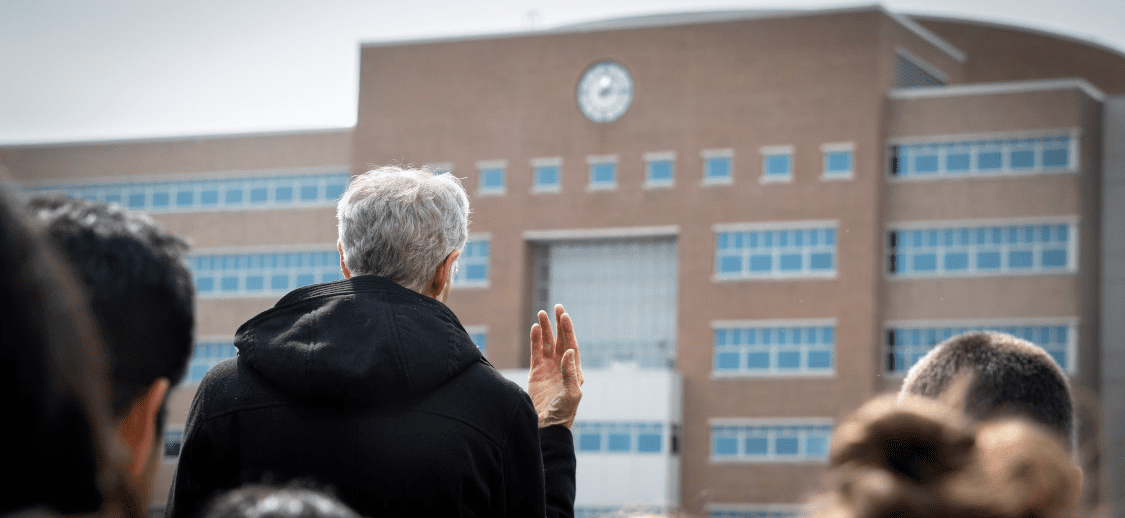 Bill Nye looks up at the solar noon clock on Rhodes Hall at Cornell Engineering