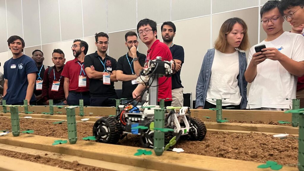 A strawberry-pruning robot operates at the American Society of Agricultural and Biological Engineers Robotics Student Design Competition