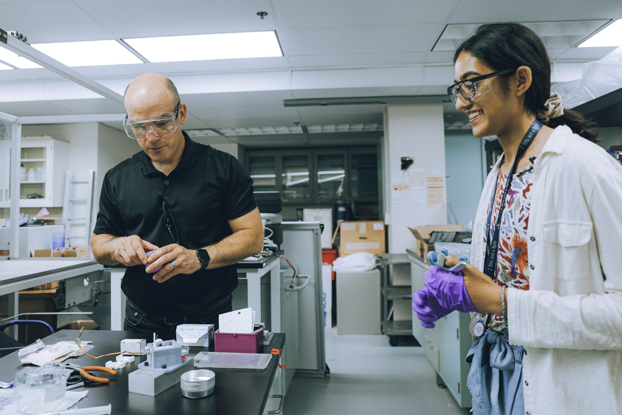 Tobias Hanrath and Anjali Asthagiri work in the lab