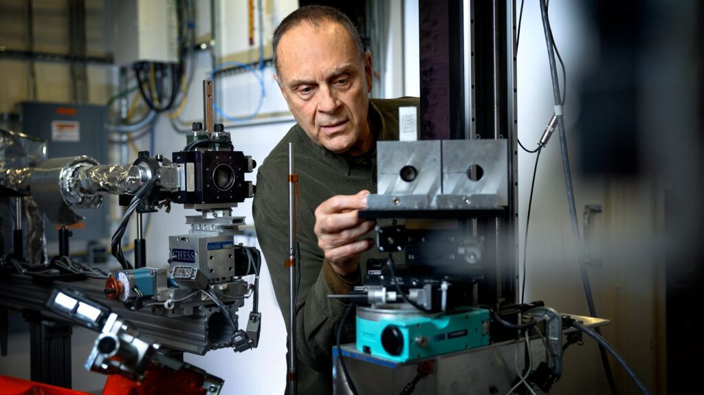 Professor Matt Miller works with synchrotron equipment