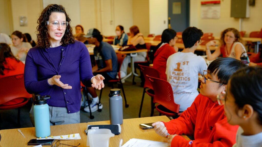 Professor Allison Godwin talks to students in informal environment