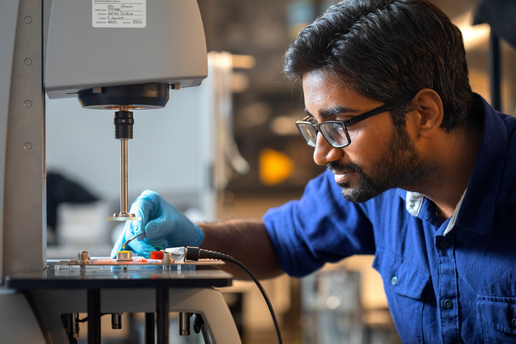 Student works with shear thickening fluid