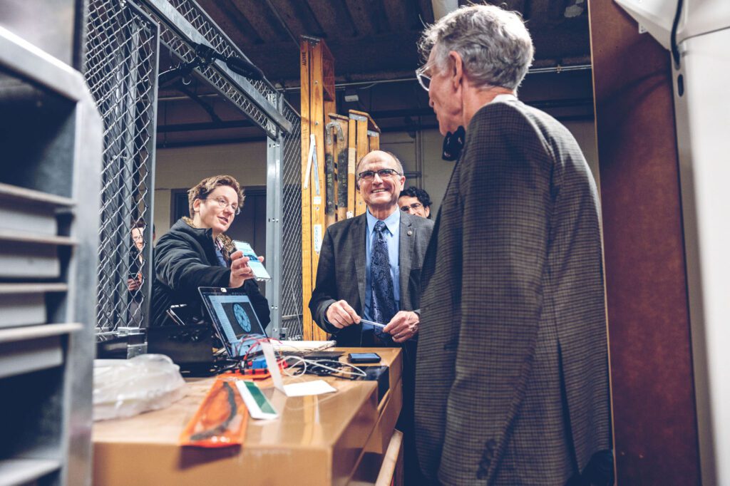 Chris Lastovicka and Joe Skovira discussing Solar Noon Clock project with Bill Nye