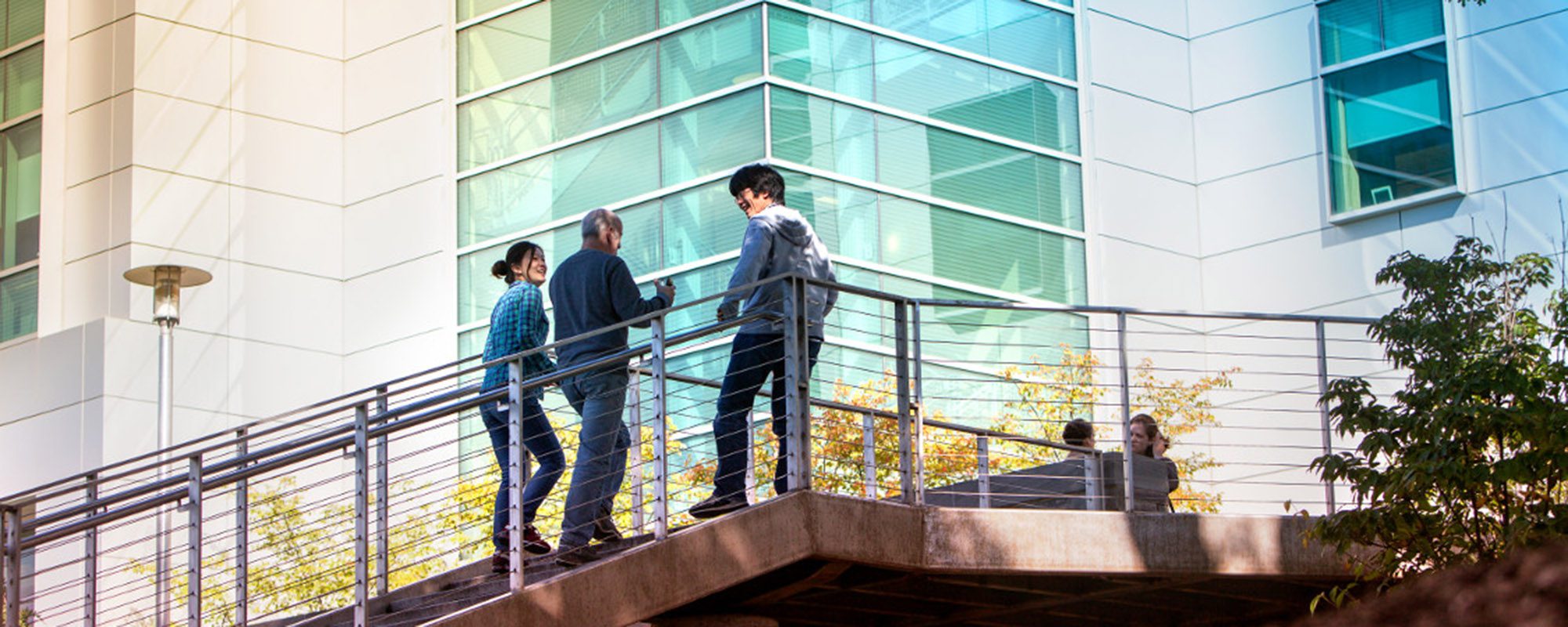 Students outside Duffield Hall in fall.