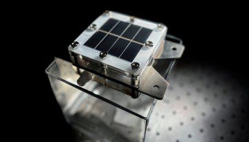 a metal box with photovoltaics on top