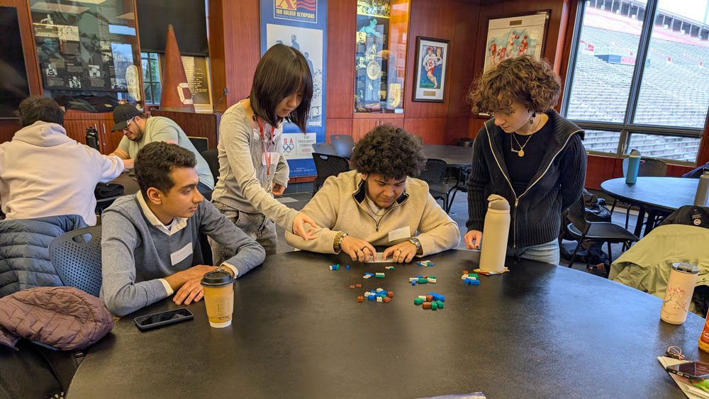 Students work with legos at table