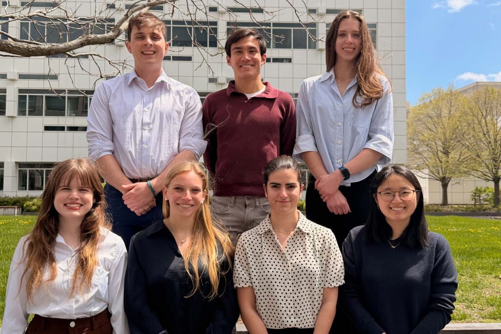 Biomedical engineering 2026 NSF GRFP awardees stand together outside of Weill Hall. Justin Levine, Ryan Lyppens, Alexandra Kot, Ella Sultan, Alexandra Griffin, Seo-Ho Lee, and Mary Mikos.