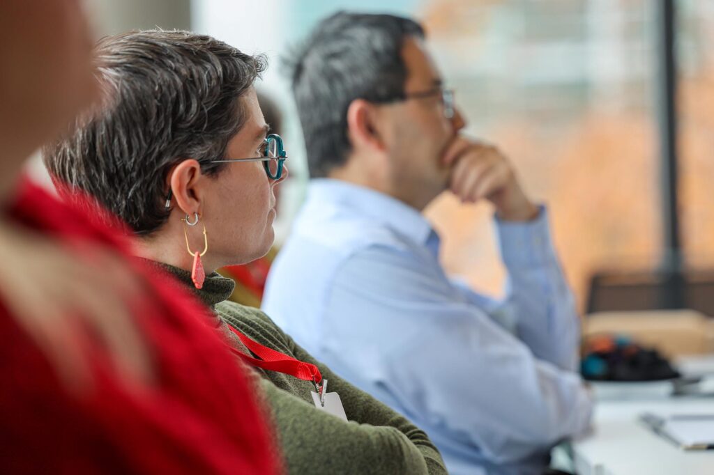 Profile shots of faculty listening