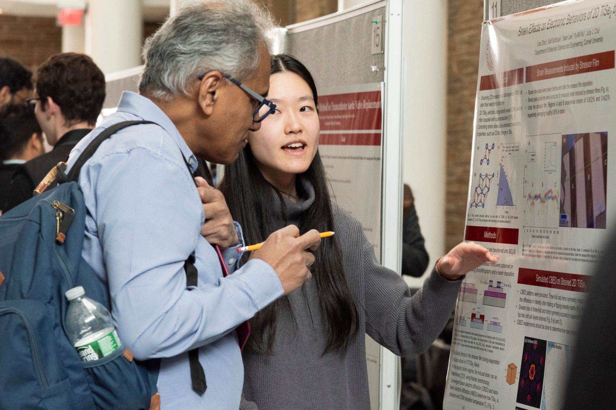Student presending to a faculty member during the 2026 MSE Awards Gala.