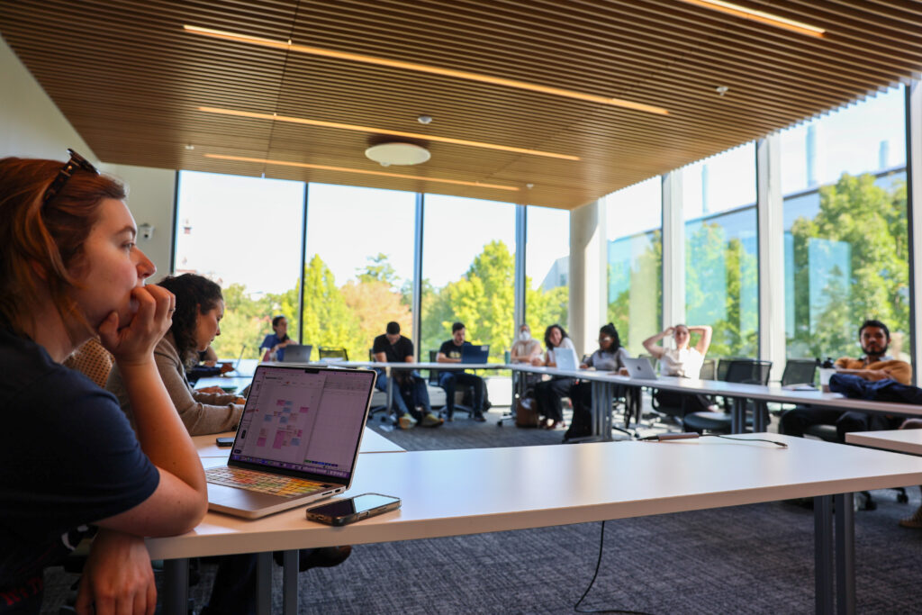 Engineering education researchers gather in a conference room.