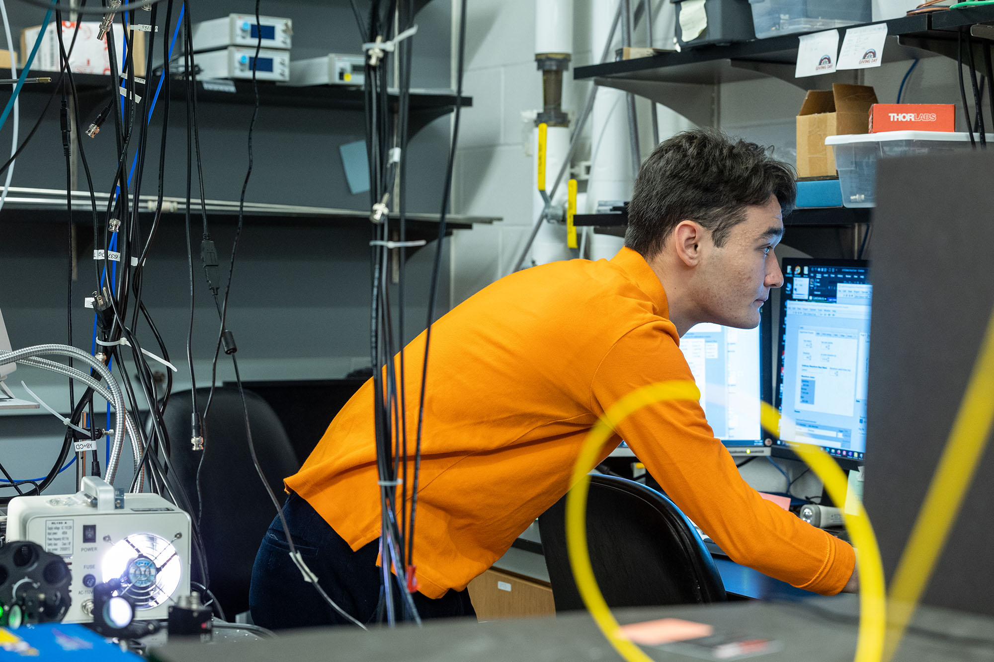 Duffield undergraduate student working on research in a lab