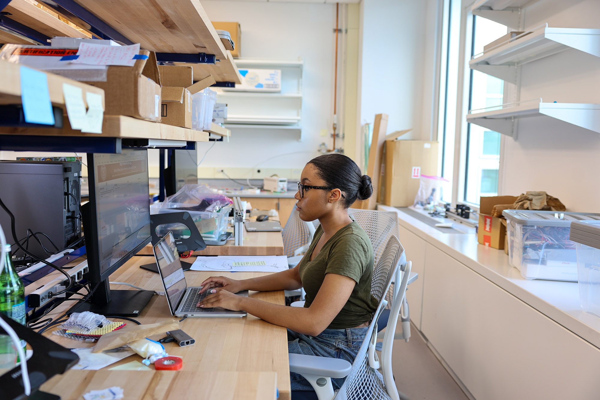 Office of Inclusive Excellence Scholar working in a lab