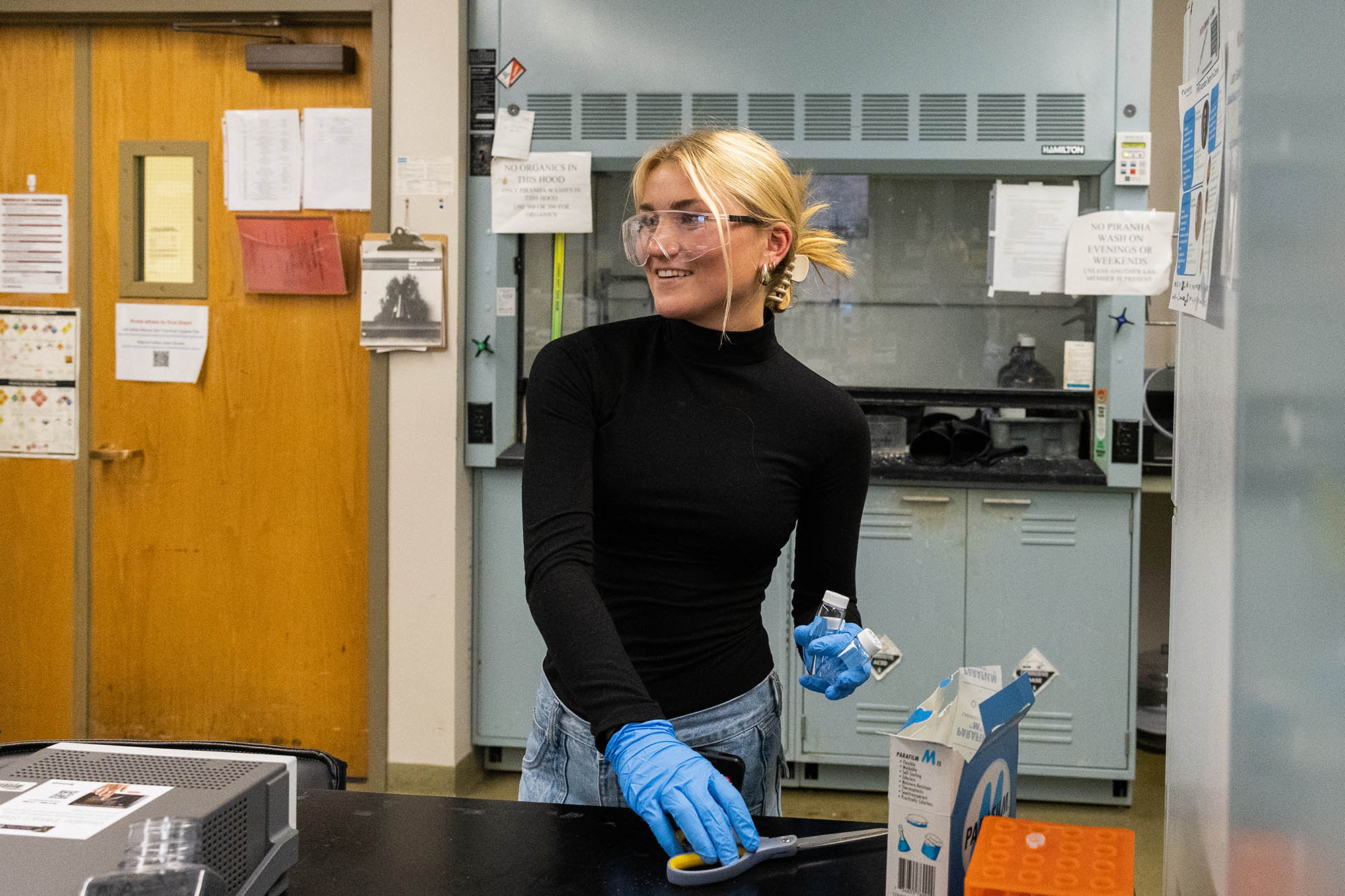 Duffield undergraduate student working on research in a lab